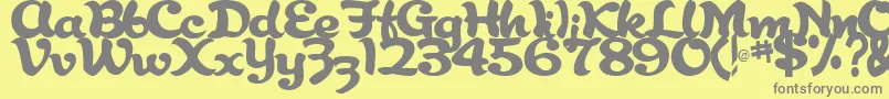 AbracadabraRegularTtstd-Schriftart – Graue Schriften auf gelbem Hintergrund