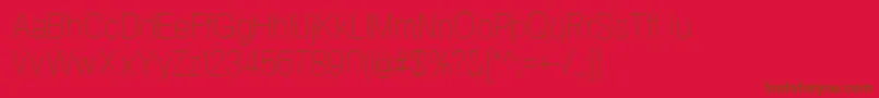 フォントNeogramUltralightcnd – 赤い背景に茶色の文字