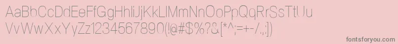 NeogramUltralightcnd-fontti – harmaat kirjasimet vaaleanpunaisella taustalla