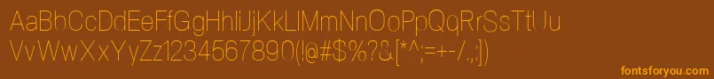 Шрифт NeogramUltralightcnd – оранжевые шрифты на коричневом фоне