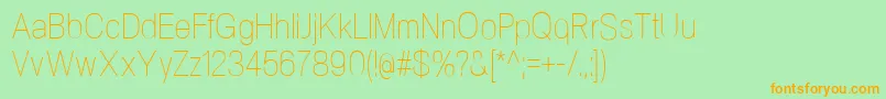 Шрифт NeogramUltralightcnd – оранжевые шрифты на зелёном фоне