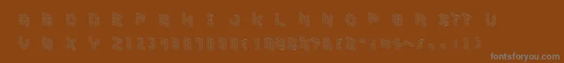 Шрифт Demoncubicblockfont – серые шрифты на коричневом фоне