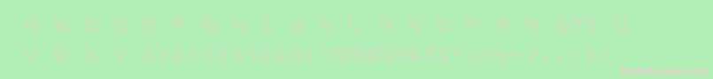 フォントDemoncubicblockfont – 緑の背景にピンクのフォント