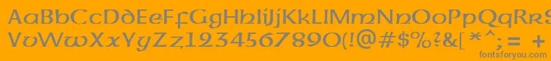 Więcej informacji o czcionce UncialAtt Czcionka UncialAtt – szare czcionki na pomarańczowym tle