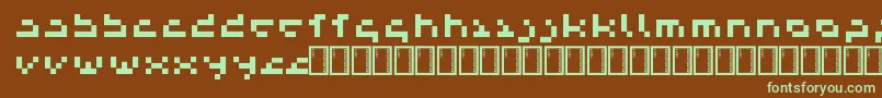 フォントSendaiSmallprint – 緑色の文字が茶色の背景にあります。