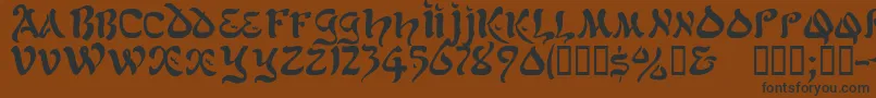 Jacamarssk-Schriftart – Schwarze Schriften auf braunem Hintergrund