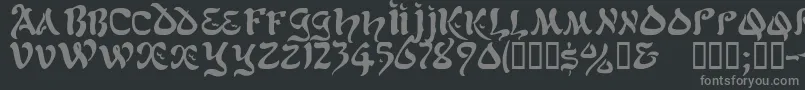 Jacamarssk-fontti – harmaat kirjasimet mustalla taustalla