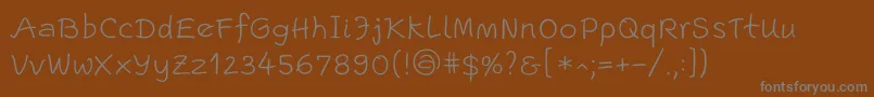 フォントEscriptLtLight – 茶色の背景に灰色の文字