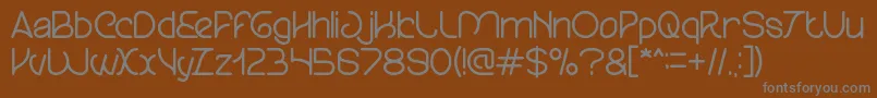 フォントTreesOfHappiness – 茶色の背景に灰色の文字