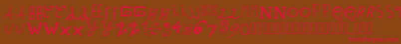 Pwpatchwrks-Schriftart – Rote Schriften auf braunem Hintergrund