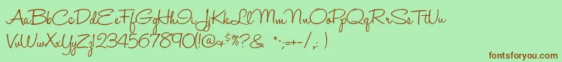 Halohandletter Font – Brown Fonts on Green Background