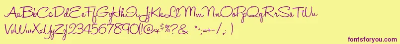 Halohandletter Font – Purple Fonts on Yellow Background