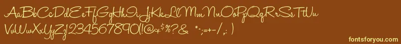 Halohandletter Font – Yellow Fonts on Brown Background