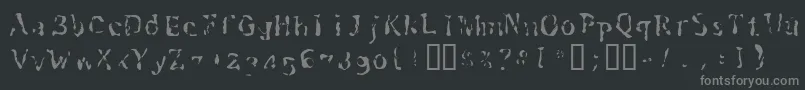 Schwennellilall-fontti – harmaat kirjasimet mustalla taustalla