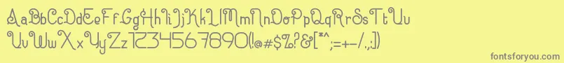 フォントEugiene – 黄色の背景に灰色の文字