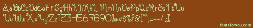 フォントEugiene – 緑色の文字が茶色の背景にあります。