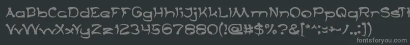 フォントTaringSerigala – 黒い背景に灰色の文字