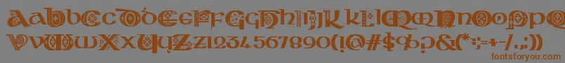 フォントKingthingsKelltika – 茶色の文字が灰色の背景にあります。