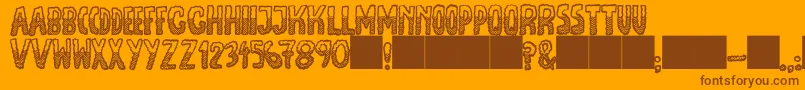 JmhEscamasBlackDown Font – Brown Fonts on Orange Background