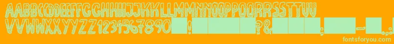 JmhEscamasBlackDown Font – Green Fonts on Orange Background