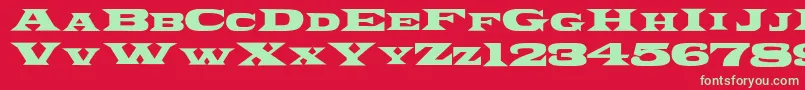 Ponchovia Font – Green Fonts on Red Background