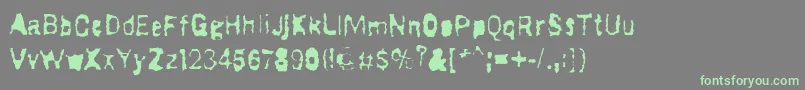 DrugstoreWaltz-Schriftart – Grüne Schriften auf grauem Hintergrund