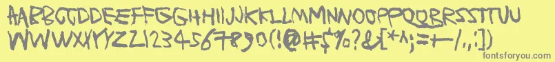PlanetGarbage-Schriftart – Graue Schriften auf gelbem Hintergrund