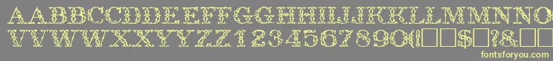Шрифт TrellisdisplaycapssskRegular – жёлтые шрифты на сером фоне