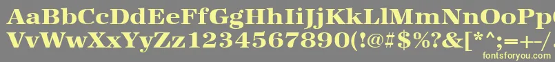 Urwantiquatextbolextwid-Schriftart – Gelbe Schriften auf grauem Hintergrund