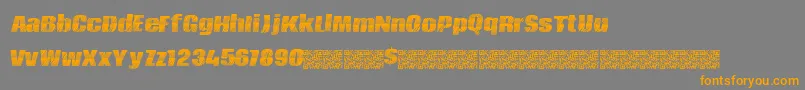 フォントKingscastle – オレンジの文字は灰色の背景にあります。
