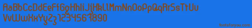 Kyma Font – Brown Fonts on Blue Background