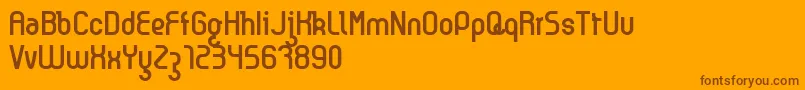 Kyma Font – Brown Fonts on Orange Background