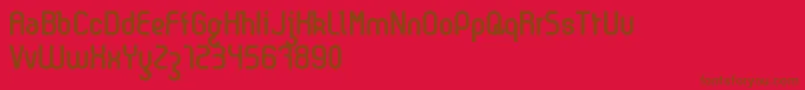 Kyma Font – Brown Fonts on Red Background