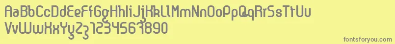 Kyma Font – Gray Fonts on Yellow Background