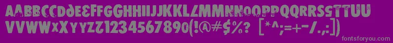 フォントDsstamper – 紫の背景に灰色の文字