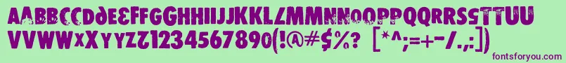 Czcionka Dsstamper – fioletowe czcionki na zielonym tle