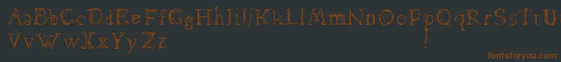 Czcionka Dawnland.Lamenta – brązowe czcionki na czarnym tle