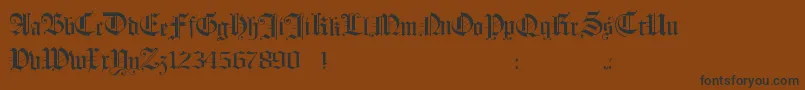 Hollandmorlaeu-fontti – mustat fontit ruskealla taustalla