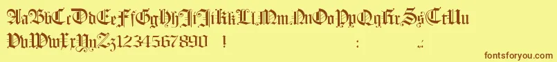 フォントHollandmorlaeu – 茶色の文字が黄色の背景にあります。