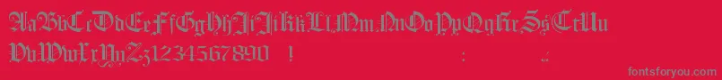 フォントHollandmorlaeu – 赤い背景に灰色の文字