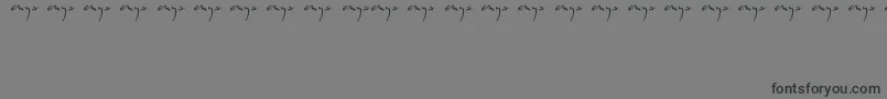 Enyalogo-Schriftart – Schwarze Schriften auf grauem Hintergrund