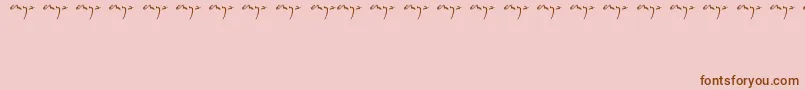 Enyalogo-fontti – ruskeat fontit vaaleanpunaisella taustalla