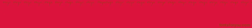 フォントEnyalogo – 赤い背景に茶色の文字