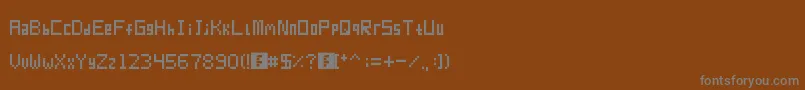 Шрифт Pixur – серые шрифты на коричневом фоне