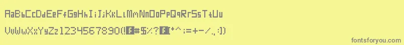 Шрифт Pixur – серые шрифты на жёлтом фоне