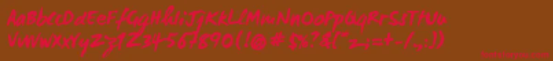 Wcmanonegraboldbta-Schriftart – Rote Schriften auf braunem Hintergrund