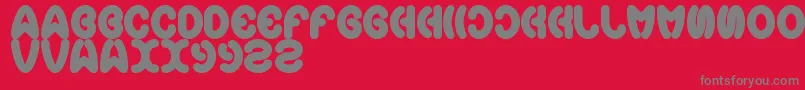 Earthheart-Schriftart – Graue Schriften auf rotem Hintergrund