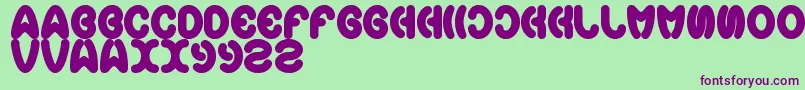 Earthheart Font – Purple Fonts on Green Background