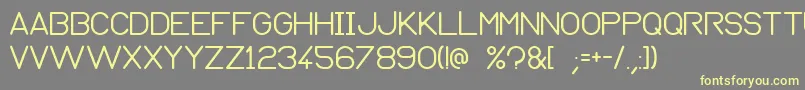 Normograph Font – Yellow Fonts on Gray Background