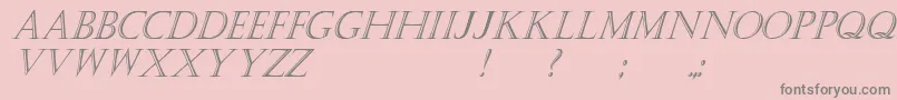 KastellarItalic-fontti – harmaat kirjasimet vaaleanpunaisella taustalla